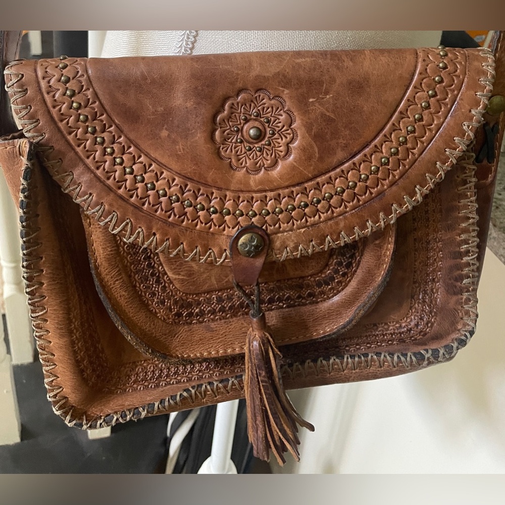 Patricia Nash Beaumont leather crossbody bag  with tassels.